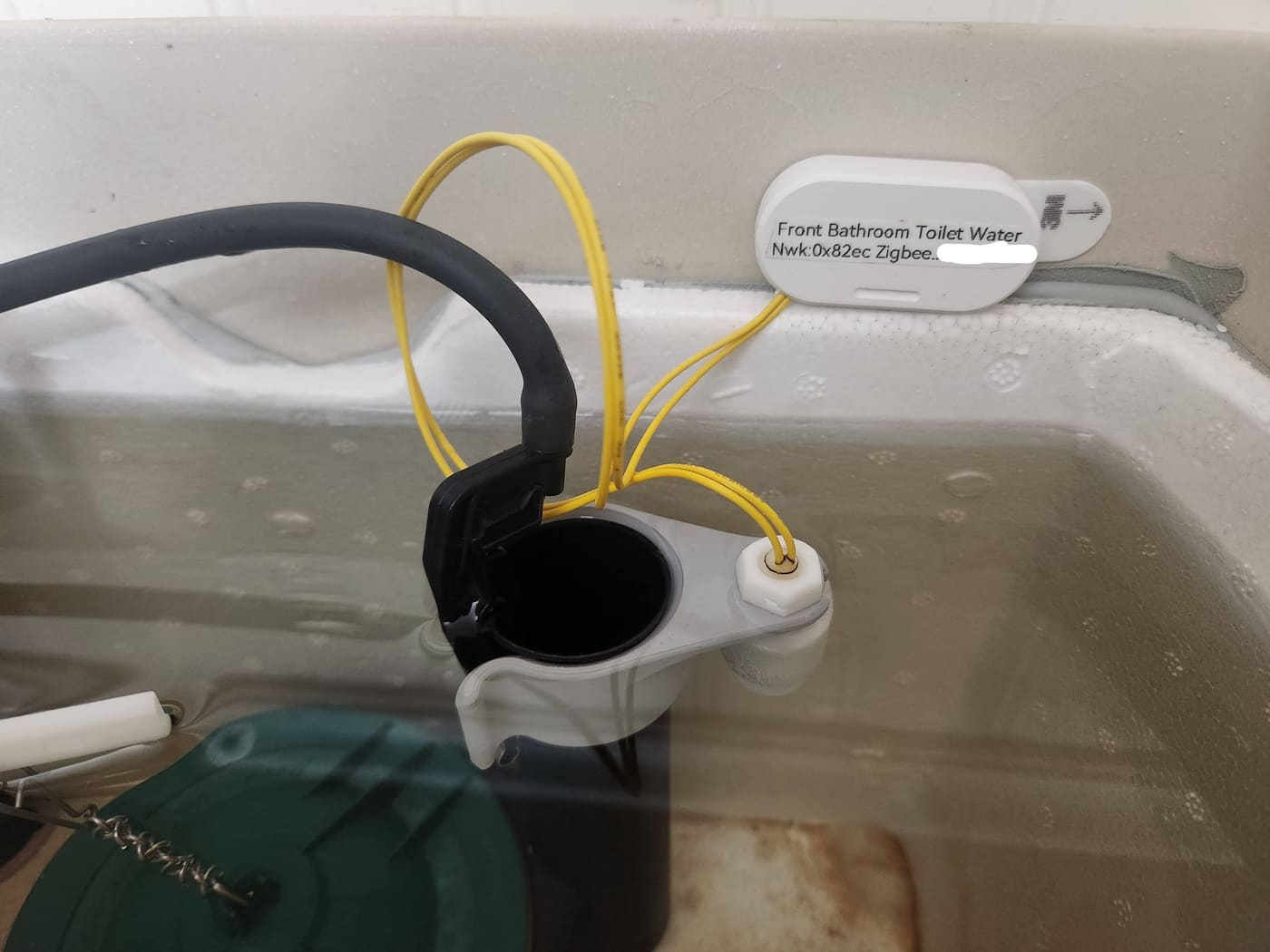 Same installation with the tank refilled after the flush completes